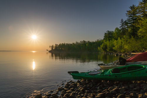 kayaking at sunset on lake superior